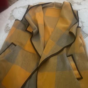 Yellow and brown vest